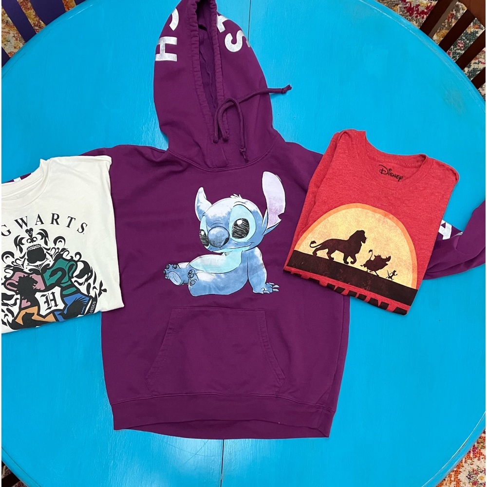 Disney 3 medium adult shirts.
